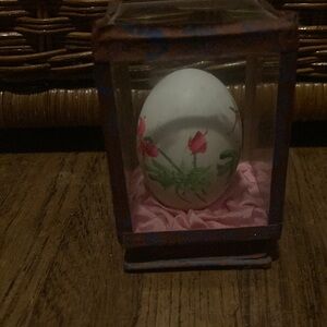 Egg in glass box